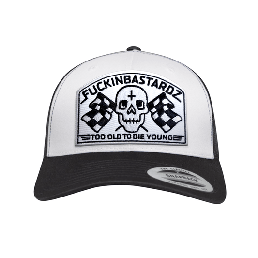 Die Old Trucker Cap with embroidered patch featuring a skull and checkered flags.