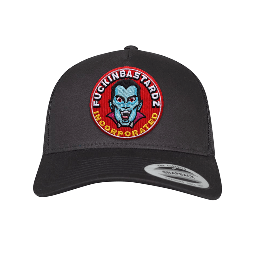 Dracula trucker cap with embroidered patch featuring a vampire design and statement, black snapback style.