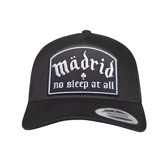 Madrid No Sleep trucker cap with embroidered patch displaying the text 'madrid no sleep at all' on a black background.