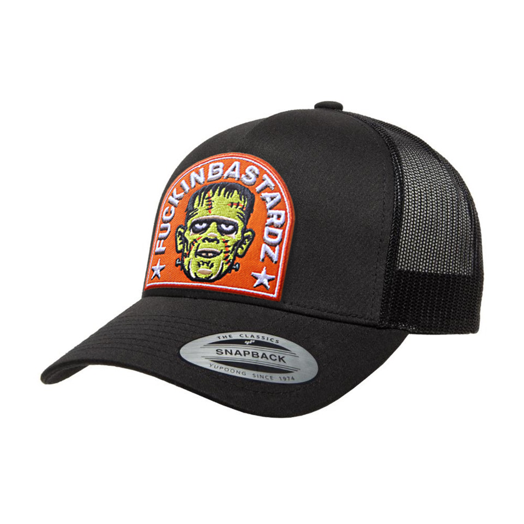 Frankie trucker cap with embroidered patch and mesh back, adjustable snapback closure, stylish black design