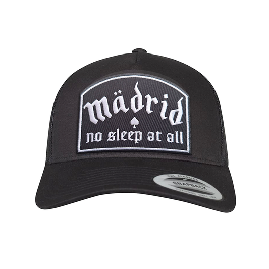 Madrid No Sleep trucker cap with embroidered patch displaying the text 'madrid no sleep at all' on a black background.